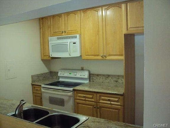 5th image of 5460 White Oak Ave Unit E112