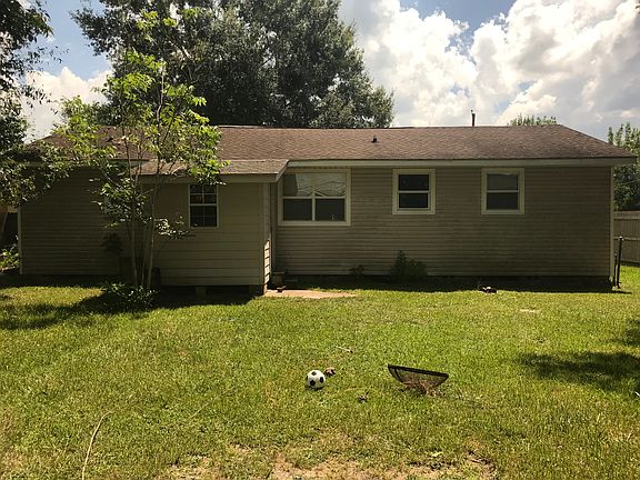 Back view w/ laundry room 