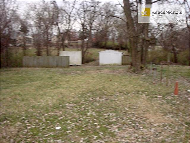 Lot with garage, creek w/bridge 60 x 270