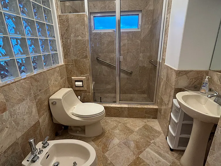 Primary bathroom in Primary bedroom with step in shower