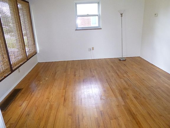 Bright Living Room with blinds included