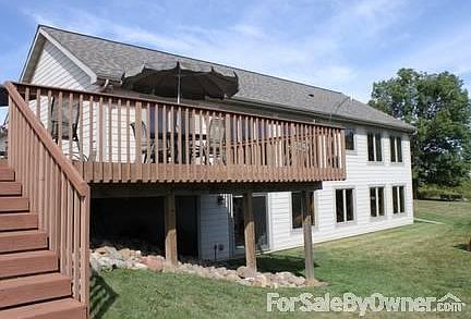 Walkout View of Home and Deck
						:
						Deck wraps the east / south sides of the home. Room for outdoor gatherings.