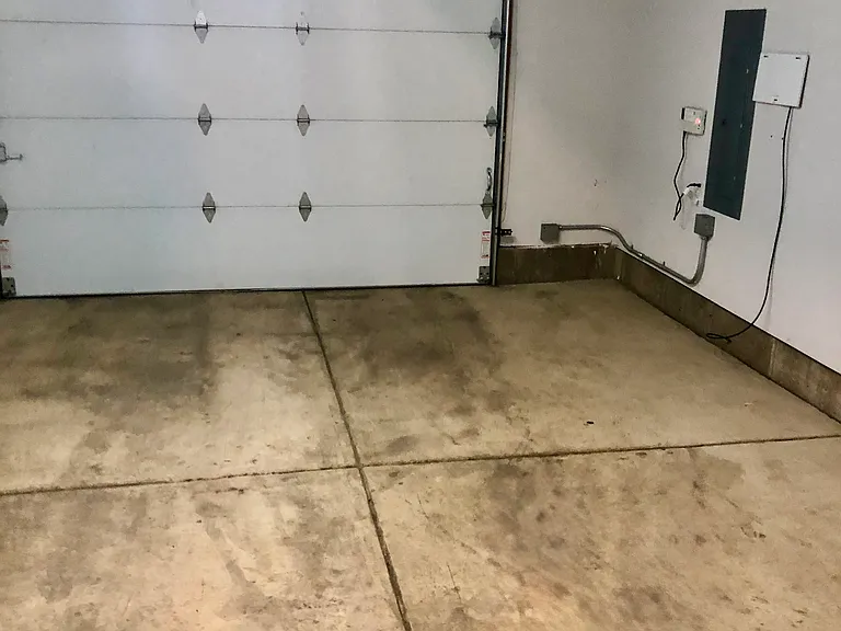 1.5 Car Garage with Additional Storage in Crawl Space