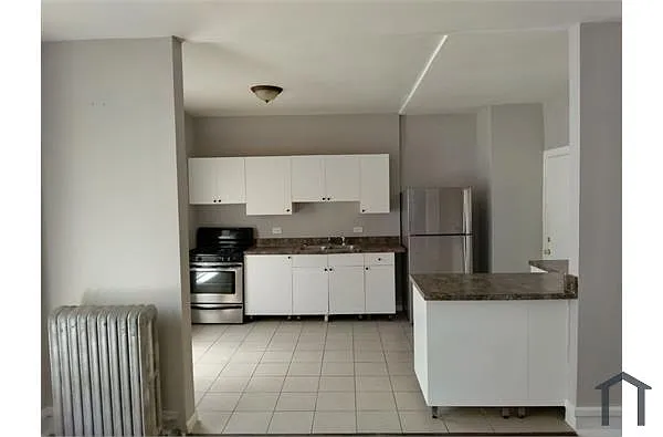 Building Photo - 6158 S Langley Ave #1