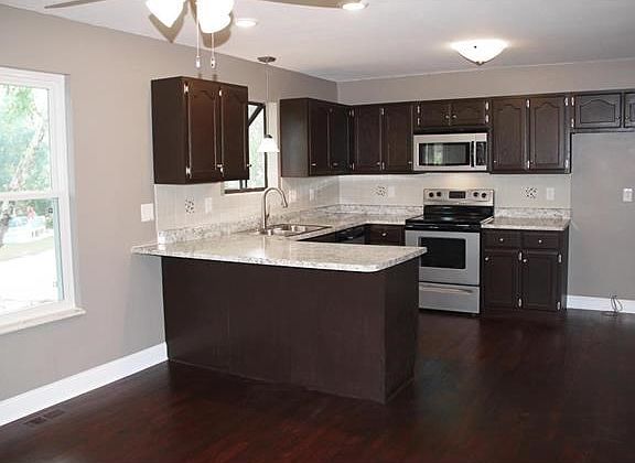 Updated kitchen with breakfast bar and garden window