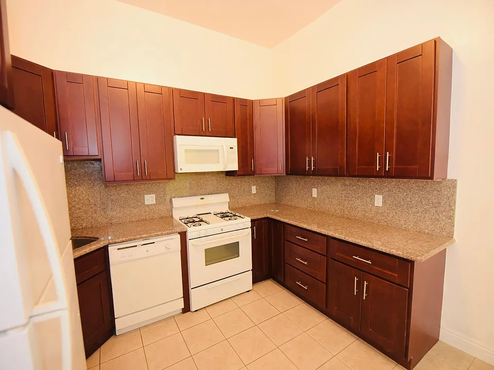 Large kitchen with granite counter top, new cabinets. newer appliances, plenty of counter space, lighting and multiple outlets for all your appliances.