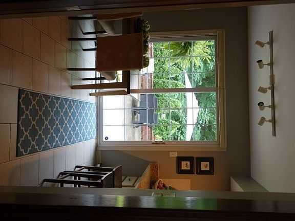 Kitchen
						:
						Kitchen leads out onto back patio