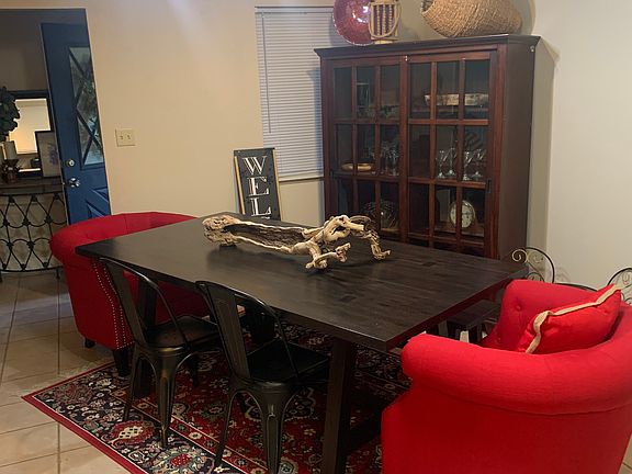 Dining area with entry back left.
