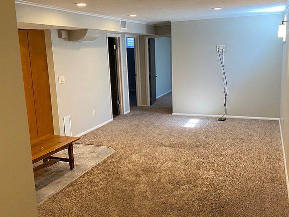 Living Room as seen from apartment entry area. Kitchen is to left.