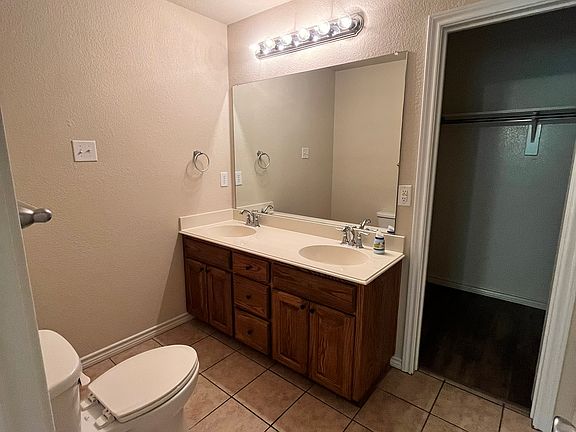 Master bath with walk-in closet