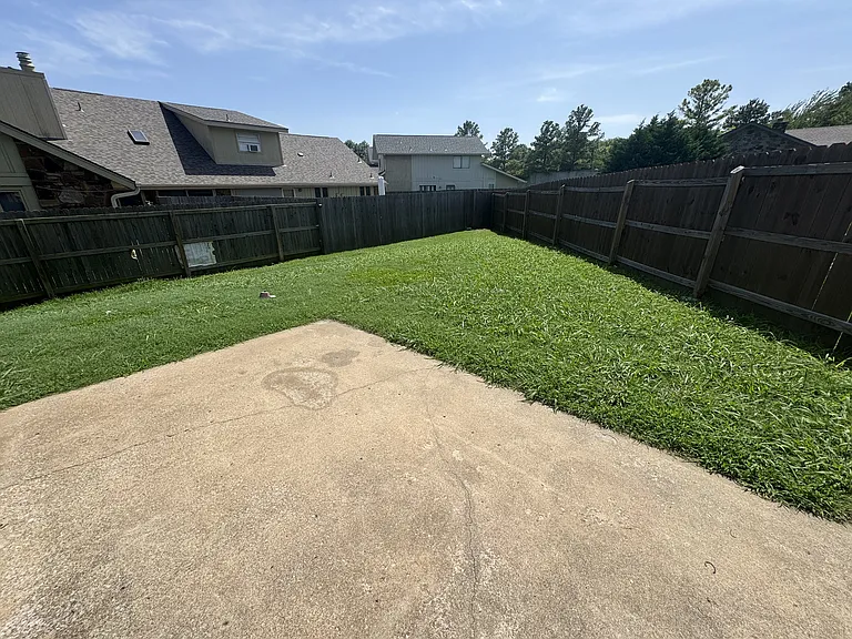 Backyard view - Lawn Maintainence Included!