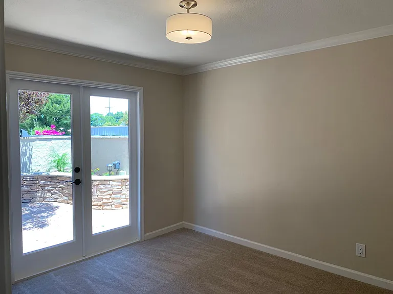 One bedroom opens to beautiful patio