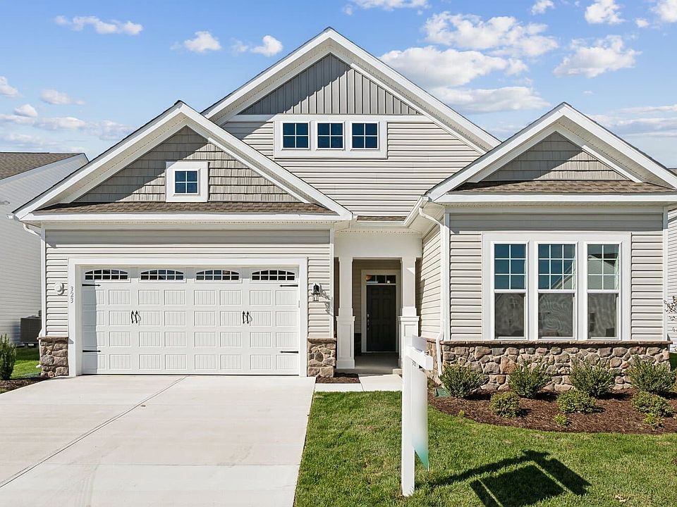 The front exterior of the Monet on homesite 1010 at Heritage Shores by Brookfield Residential.