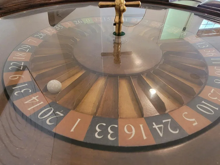 Large play area with pool table, roulette table, large TV