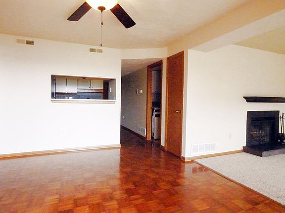 Living and dining areas overlook City; working gas fireplace; washer and dryer in unit