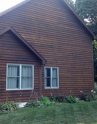 Recently re-finished cedar siding