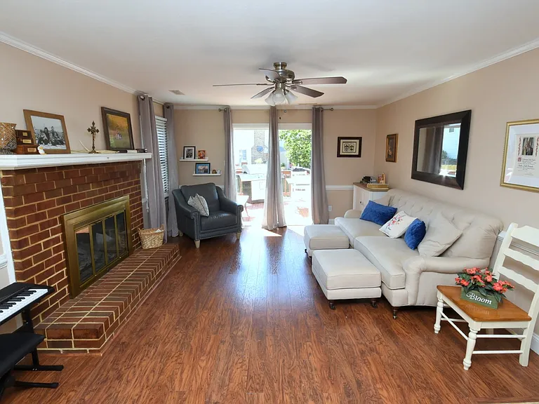 Kitchen opens to living and eating areas.