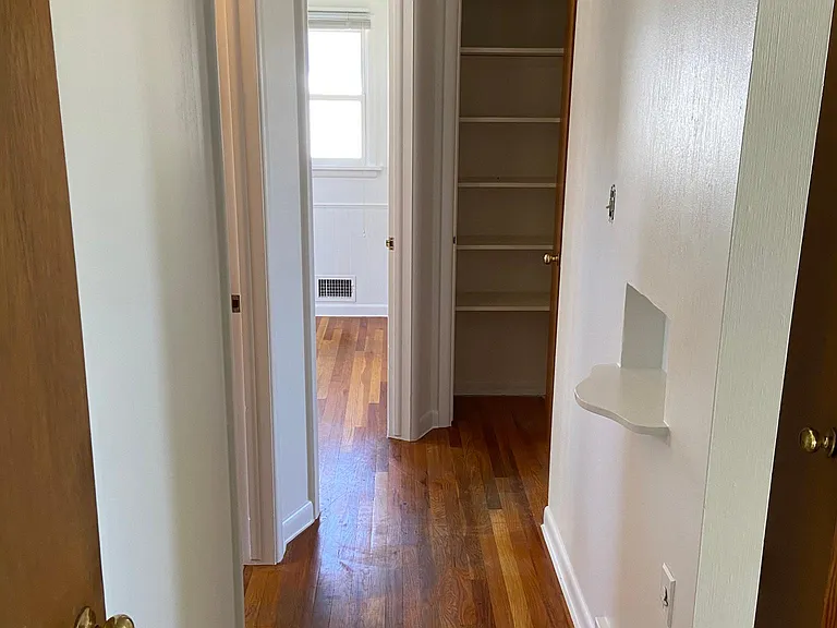 Hallway with two closets