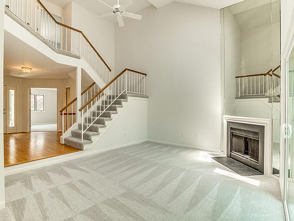 Nice sized living room with fireplace and cathedral ceiling!