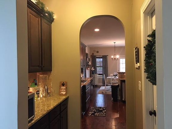 Butler's pantry with additional cabinet and counter space