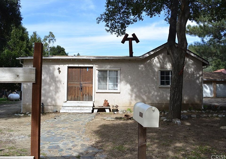 Front of the house with double door entry