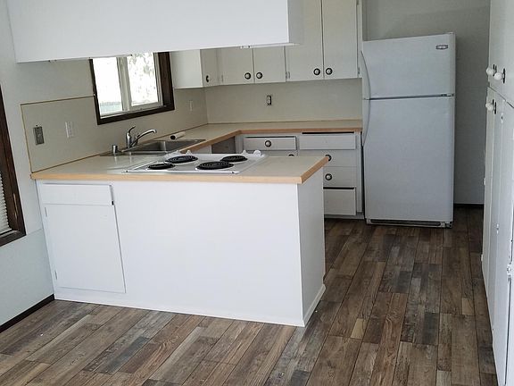 Kitchen and small dining area from Family room