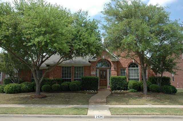 1434 Comanche front of home