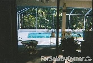master bedroom view
						:
						wheel chair accessible ramp from bedroom onto lanai, pool