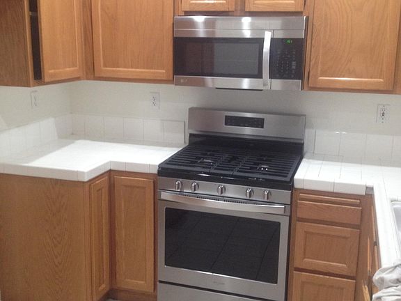 Kitchen stainless steel appliances. (range, dishwasher and m