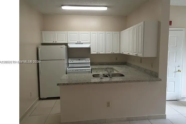 18304 NW 68th Ave #M — Photo 6