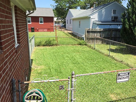 Rear fenced yard.