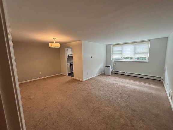 Spacious living and dining room, , lots of natural light, custom lighting and multiple outlets