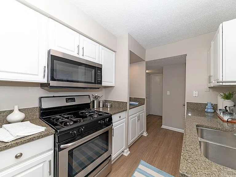 Kitchen with granite counters and stainless appliances
