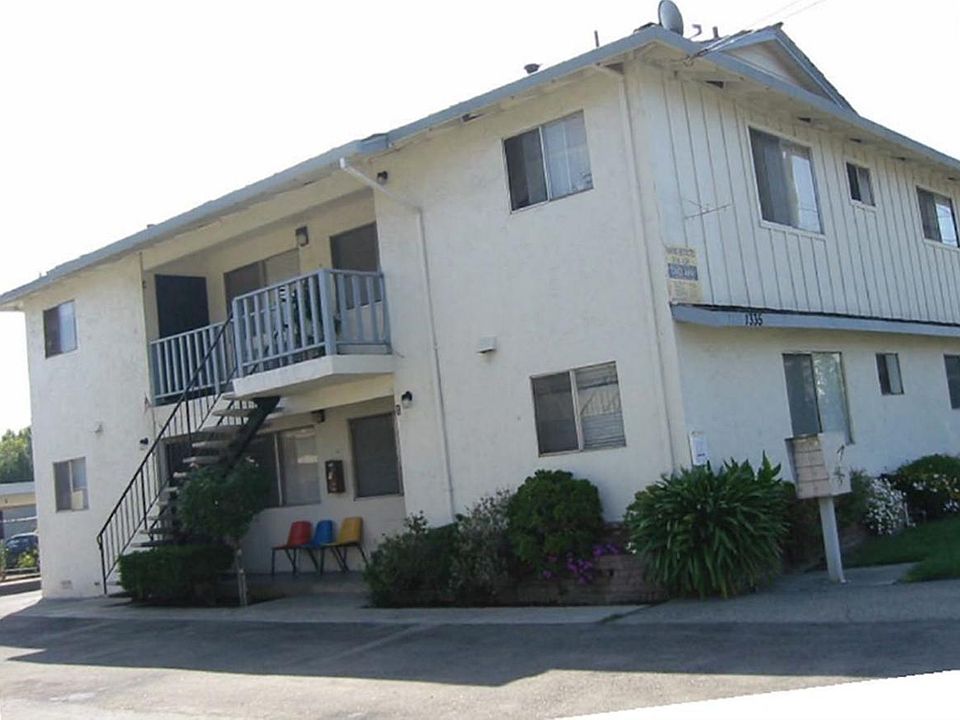 Apartment full view from the curb. The unit that is available is on the second floor on the back side of the apartment