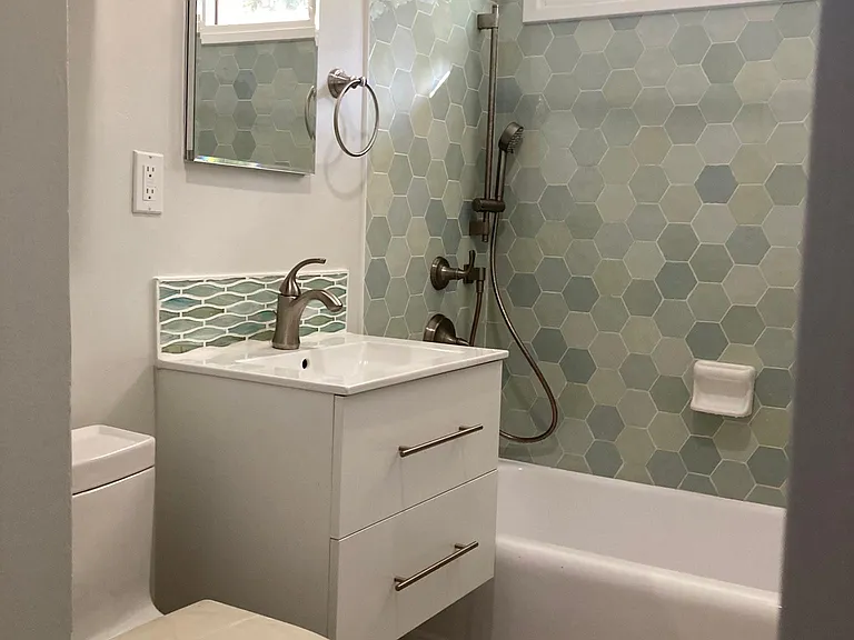 Updated bathroom with Water Wise and Energy Star fixtures.