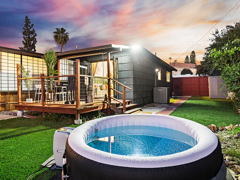 Relax and unwind in the outdoor hot tub, your personal oasis.