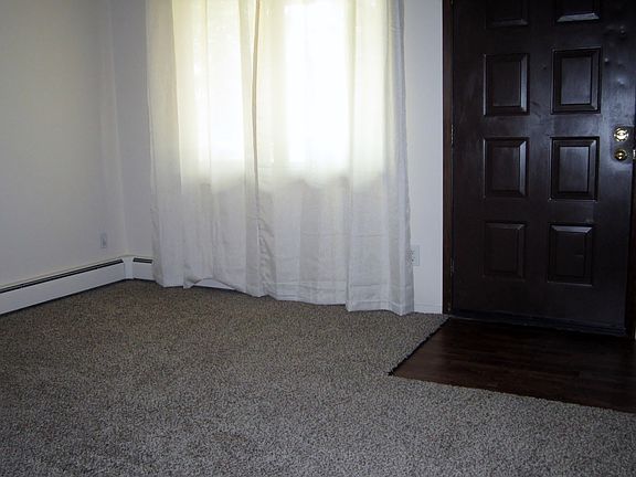 Living room has coat closet