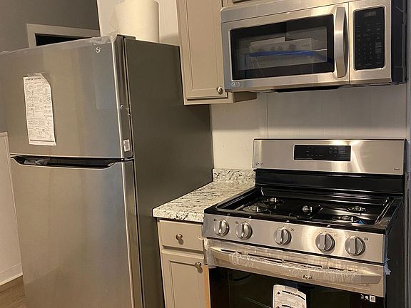 kitchen with new appliances & cabinets