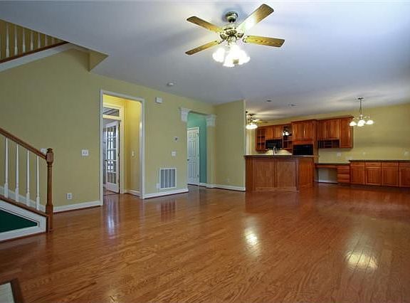 The Den is Open to the Kitchen and Breakfast Area for Friendly Gatherings