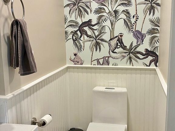 first floor half bathroom off of living room
