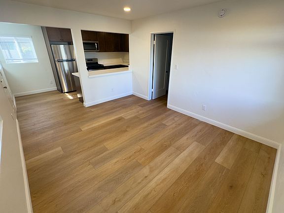 Bright Living Room with Brand New Floors