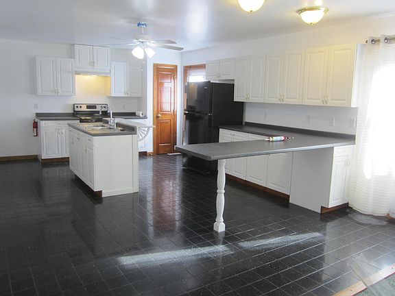 Modern, brite, and open kitchen - living room space
