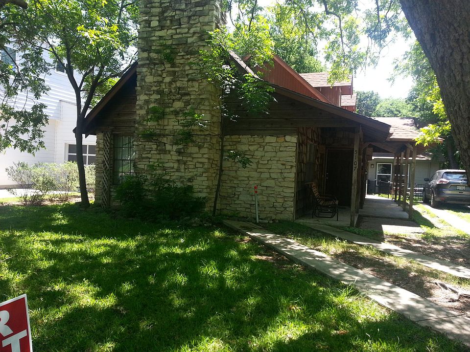 Front Exterior View, shaded by Pecan trees.