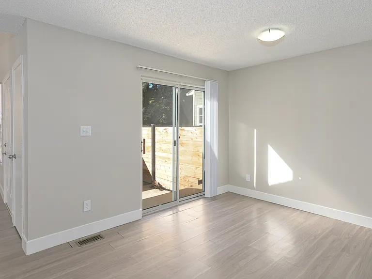 Cook, dine, and gather in a stylish dining space that walks out to your private patio - Perfect for entertaining!