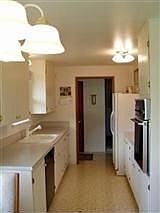 Galley-style kitchen is designed for ease of cooking