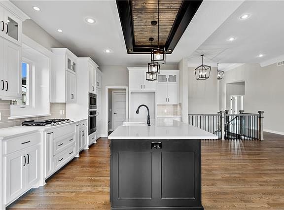 Kitchen view of island and special feature above.