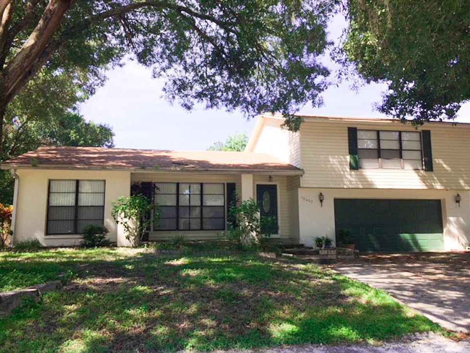 This home has a fully fenced backyard, extra wide driveway that can fit 3 cars side by side and is located on a corner lot with a spacious side year.
