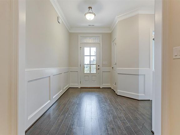 Front door entrance with wainscoting