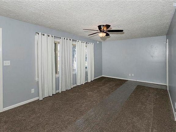 Large Living Room with Triple Windows