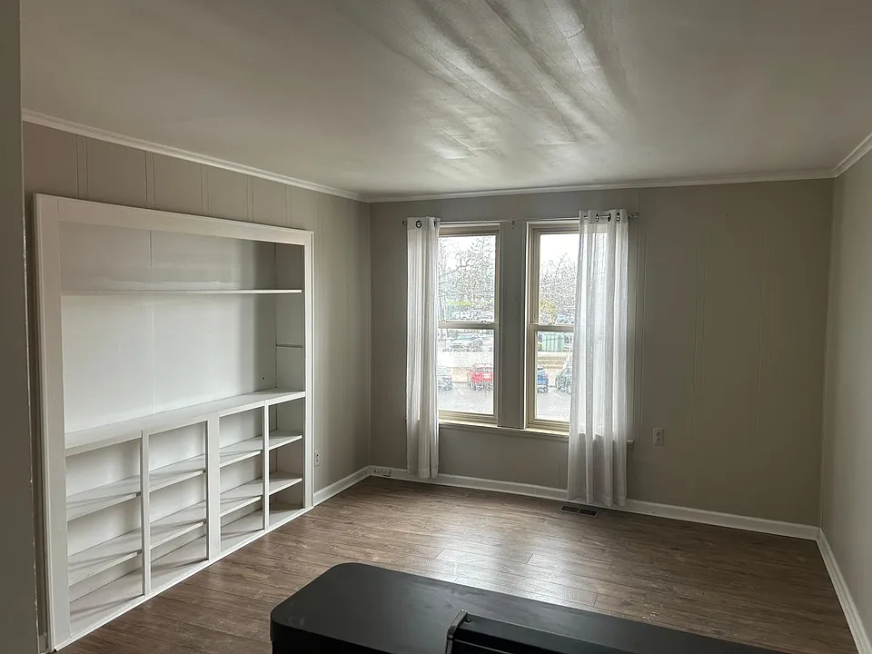117 W Grand River Ave #3